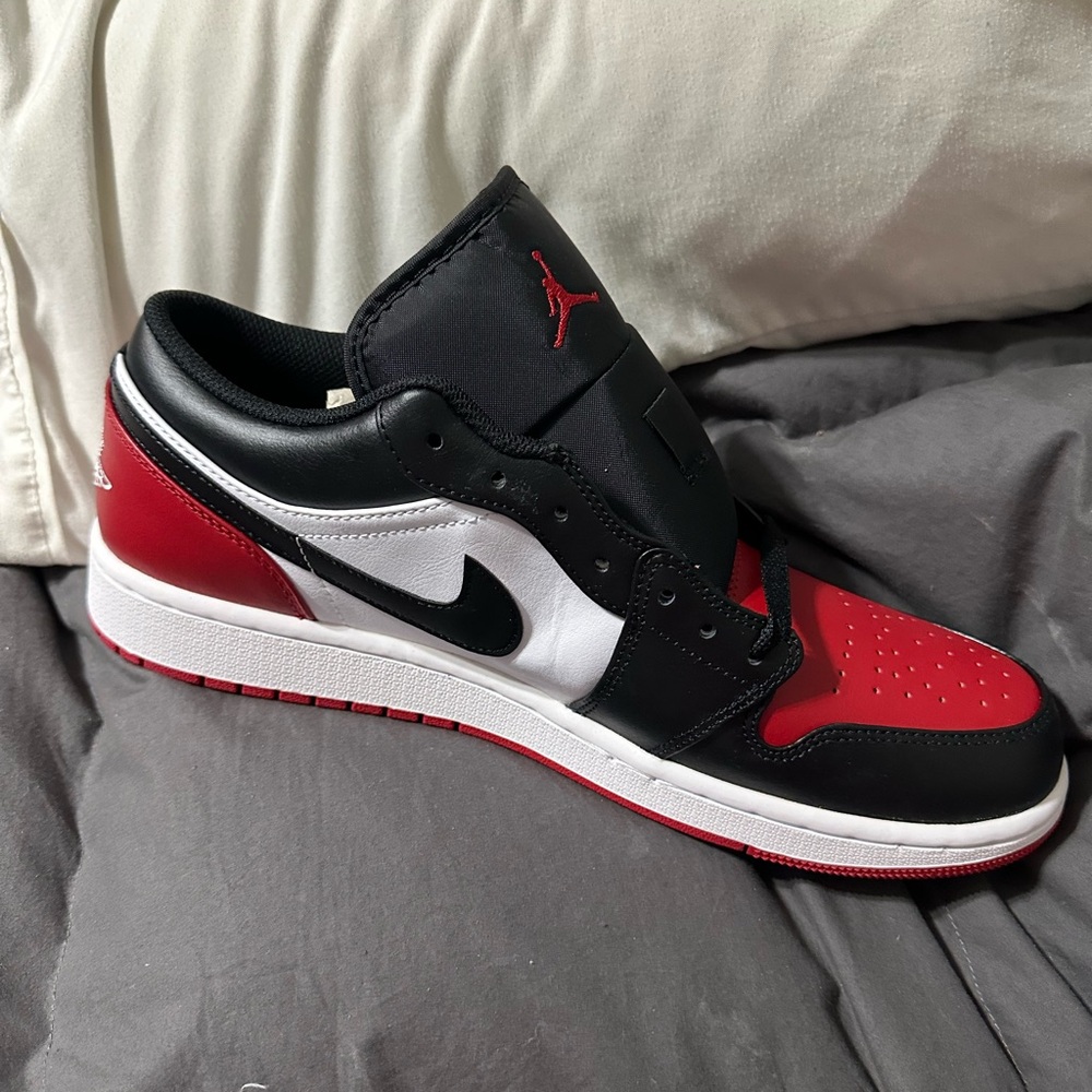 Jordan Air 1 Low in White, Black, and Red - Picture 14 of 14